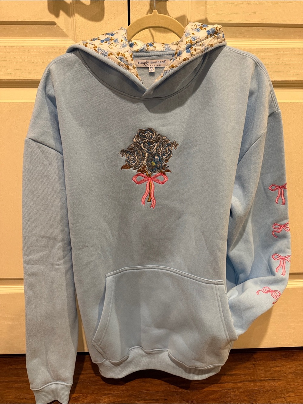 Simply Southern Light Blue Hoodie with Floral Bouquet and Pink Bows